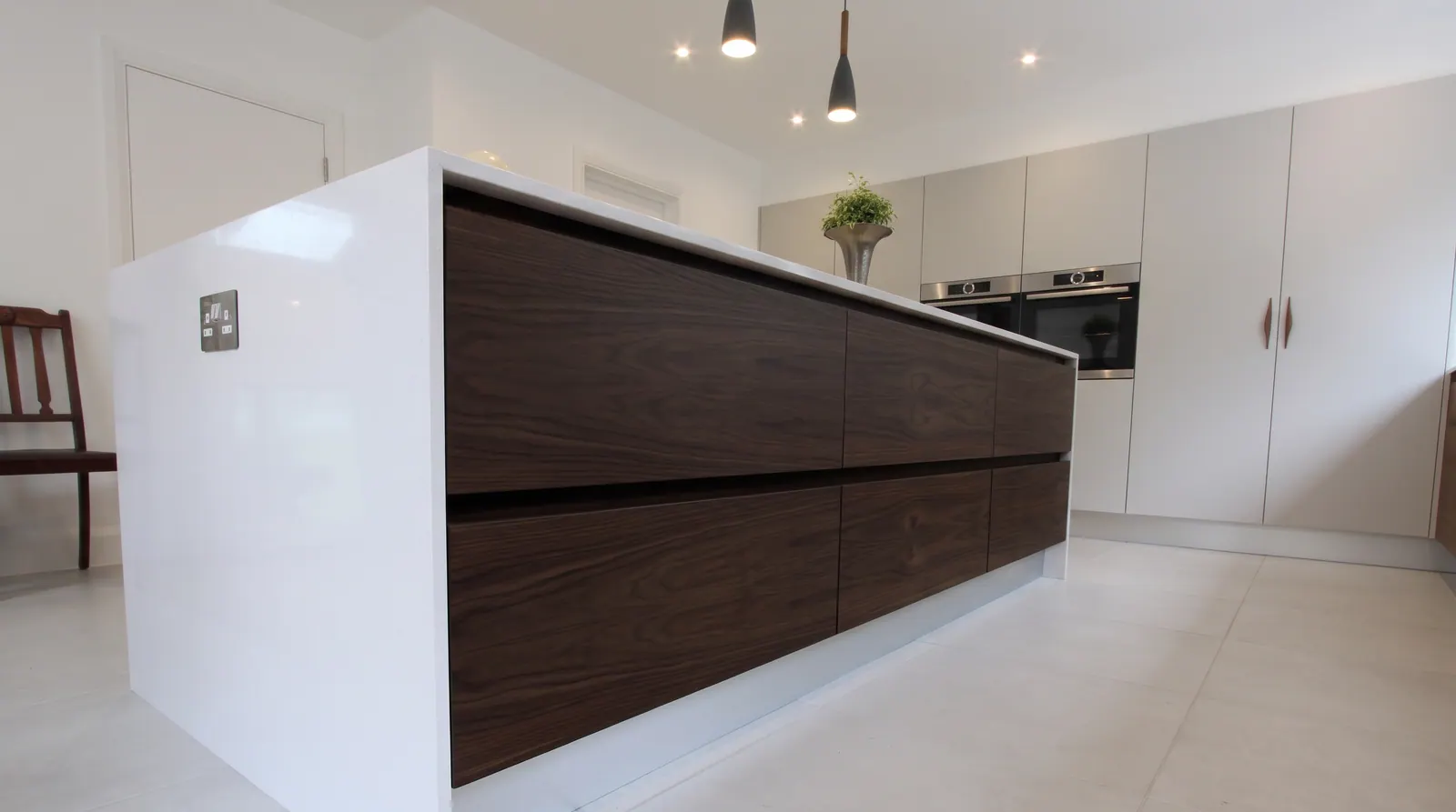 Grain-matched wood kitchen in Dark Walnut